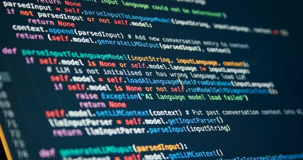 Programming code, glowing brackets, and development syntax elements displayed against a dark background conveying software engineering and coding